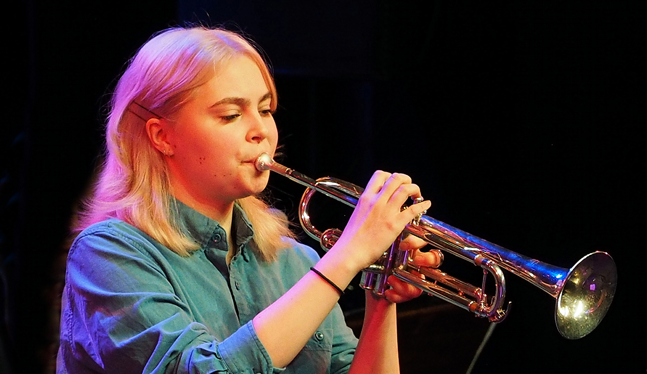 Portrait of jazz trumpet player Rebecca Ekman